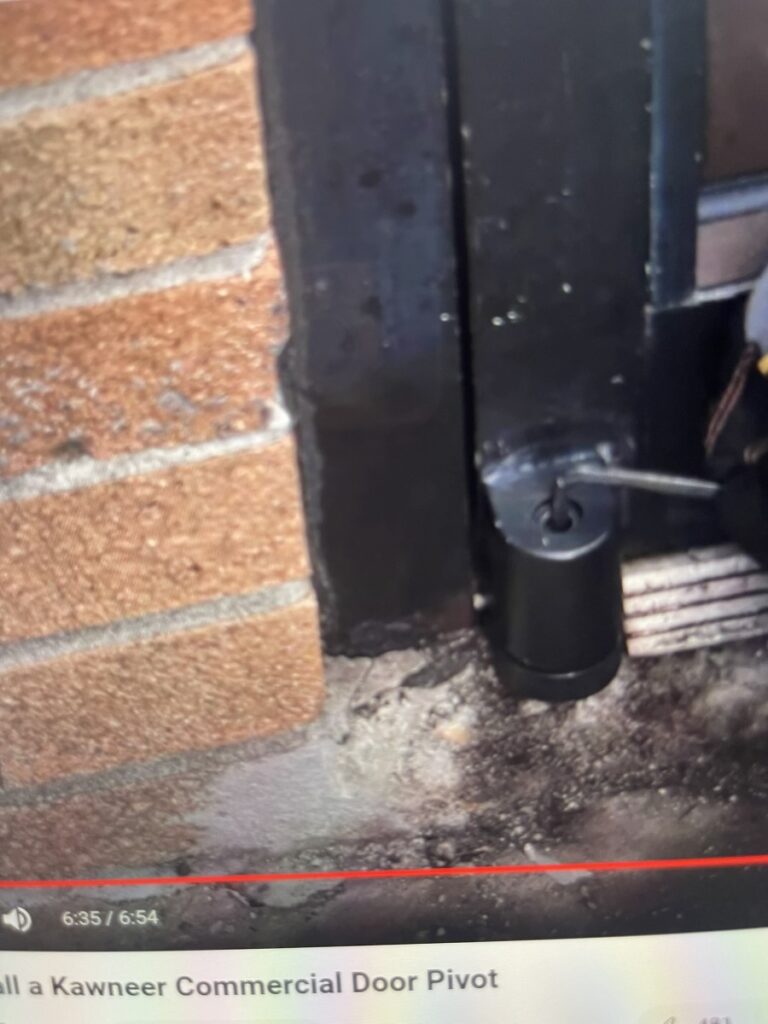 Broken Pivot Hinge Commercial Door Repair